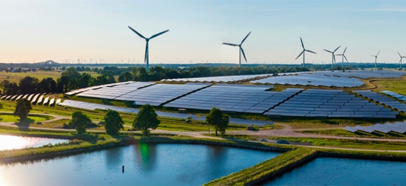 imagens de placas solares e torres eólicas gerando energia limpa visando a diminuição do aquecimento global